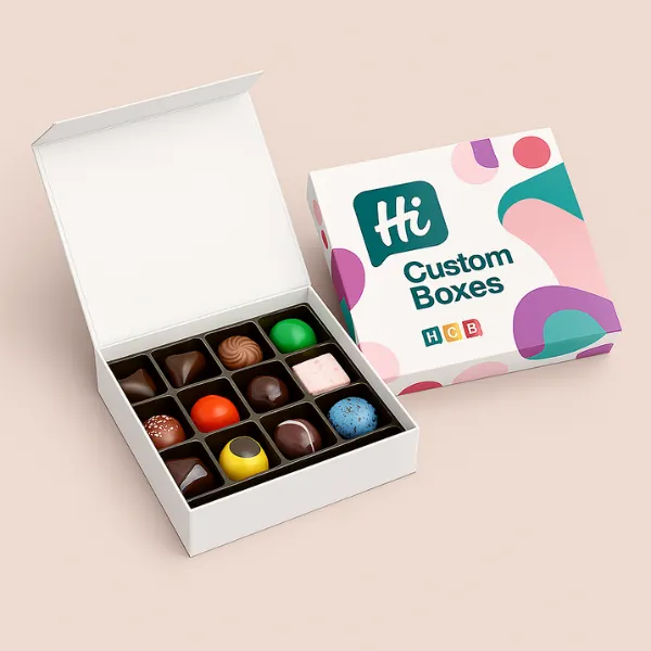 Square chocolate boxes with dividers - one open plain white showing assorted chocolates- one closed with abstract pastel shapes and Hi Custom Boxes logo-