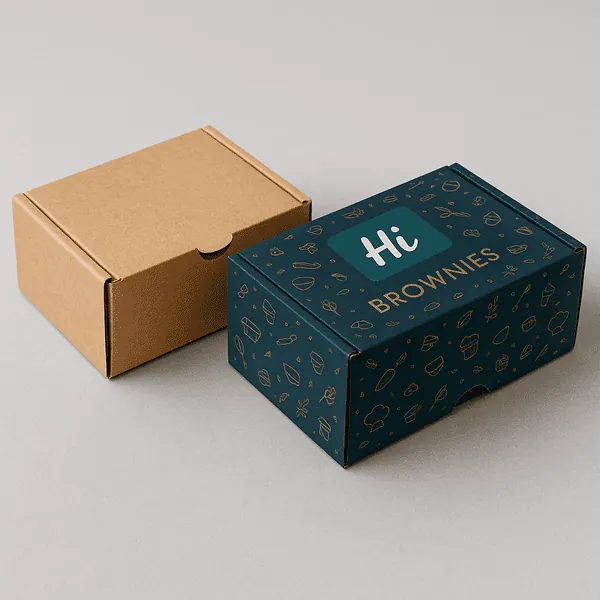 Two closed brownie boxes one plain kraft one custom printed with Hi Brownies branding design class=