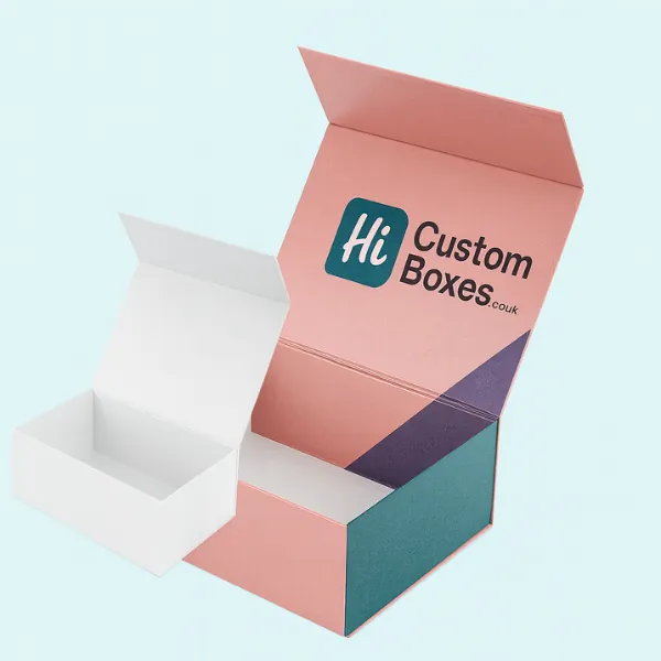 Two open mailer boxes- one plain white and one fully printed in teal- pink- and purple with Hi Custom Boxes branding inside the lid- class=