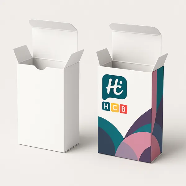 Plain and custom-printed tuck-end boxes side by side- with the printed version featuring the HCB logo and colorful geometric design