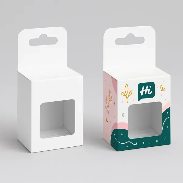 Hanging window packaging boxes- one plain white and one decorated with pink- teal- and gold graphics featuring leaves- stars- and -Hi class=