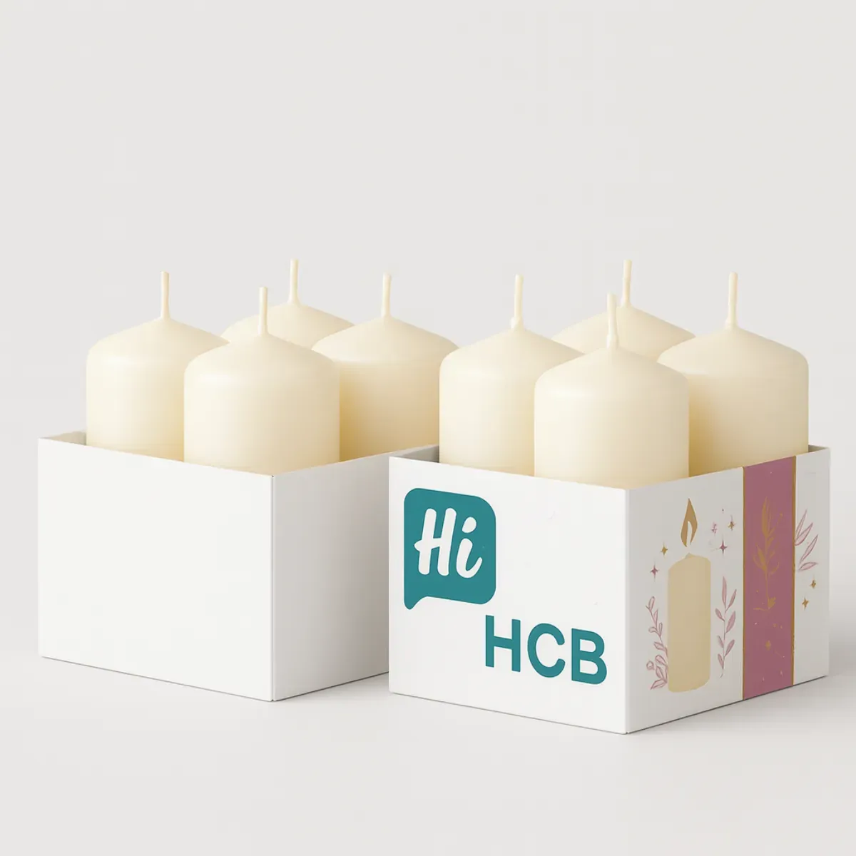 Two rectangular tray-style boxes holding cream-colored candles- One is plain white- while the other has custom printed design with teal- pink- and candle illustrations along with -Hi HCB- branding- class=