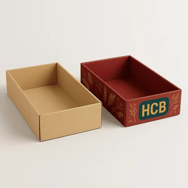 Two open tray boxes one plain kraft and one red printed box with HCB and wheat leaf design