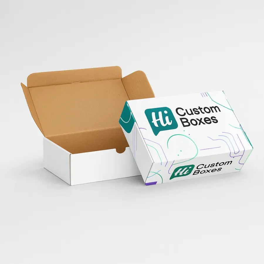 wo closed rectangular mailer boxes- one plain white showing its kraft interior- and one white box custom-printed with the -Hi Custom Boxes- logo and light purple and teal line graphics