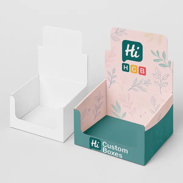 Open counter display box mockup shown in plain white on the left and branded design on the right with pink and teal floral patterns and -Hi HCB Custom Boxes- logo- class=