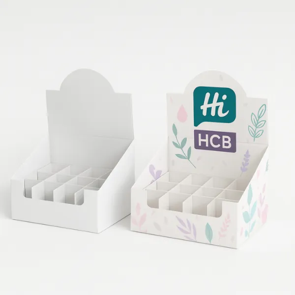 Two display-style boxes with circular insert cutouts- one plain white and one in pink- teal- and purple with Hi Custom Boxes branding on raised back panel- class=
