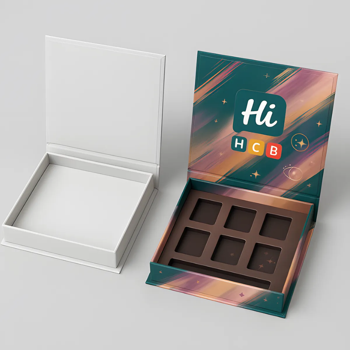 Open rigid gift box mockup- one plain white and one designed with pink interior and teal exterior- gold HCB logo inside lid- class=