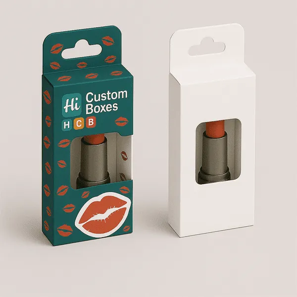 Two lipstick packaging boxes with hang tabs one plain white and one printed with Hi HCB branding class=