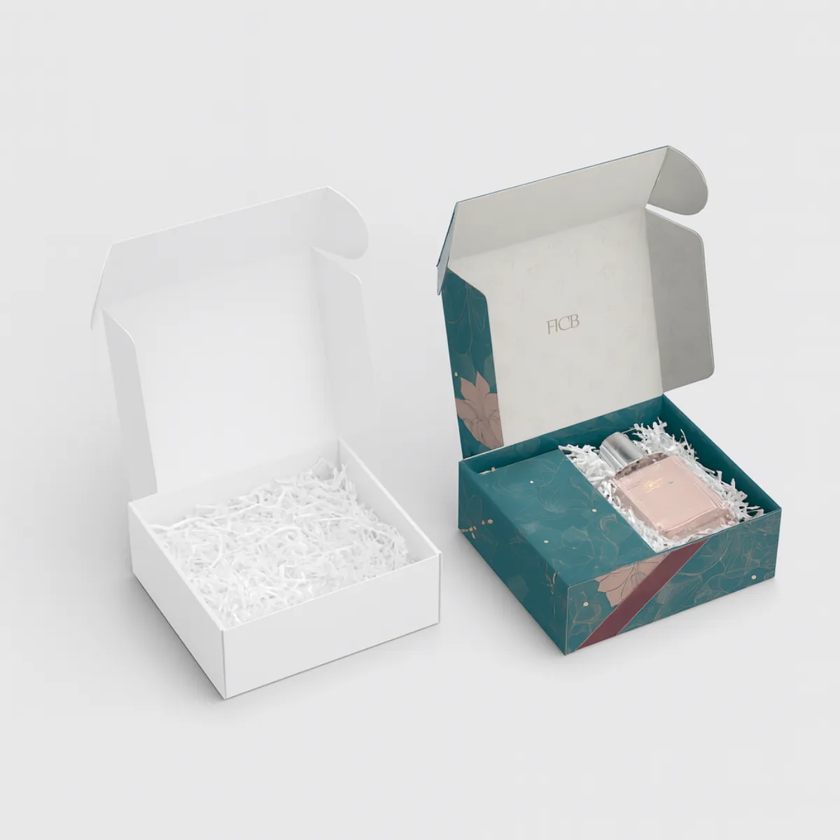 Two open square boxes- left is plain white- right is pink with floral design- teal -HCB- logo- and a teal vase illustration on the front- class=