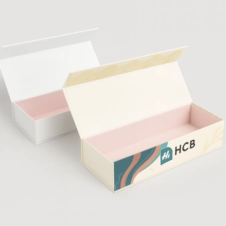 Custom rigid drawer box with ribbon pull tab- plain white on the left and branded design on the right featuring HCB logo and teal ribbon handle-