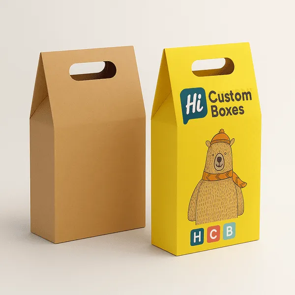 Gable style cereal boxes with cutout handles one plain and one printed with HCB branding class=