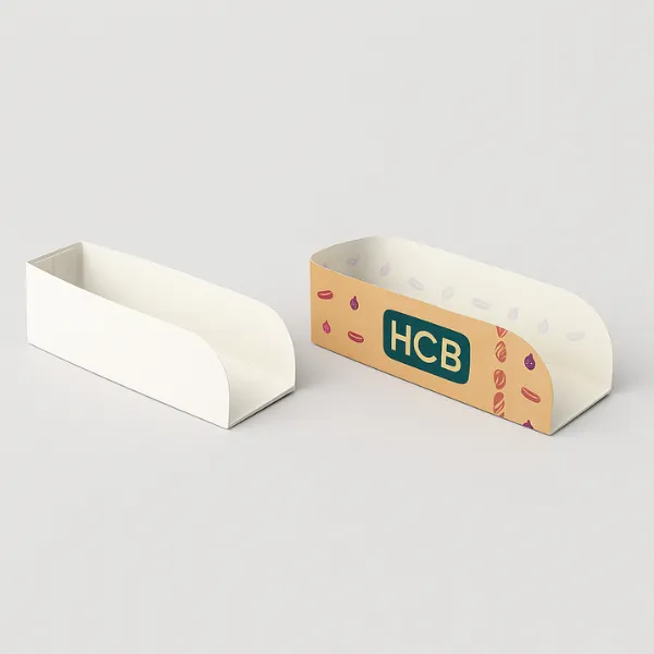Long rectangular food sleeve boxes- one plain white and the other printed with HCB logo and colorful graphic accents- class=