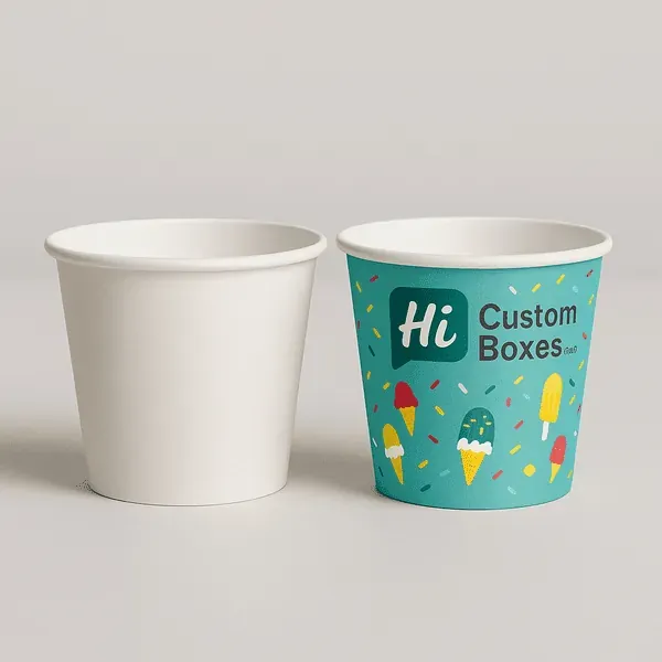 Two ice cream cups side by side one plain white one teal with sprinkles and Hi Custom Boxes print class=