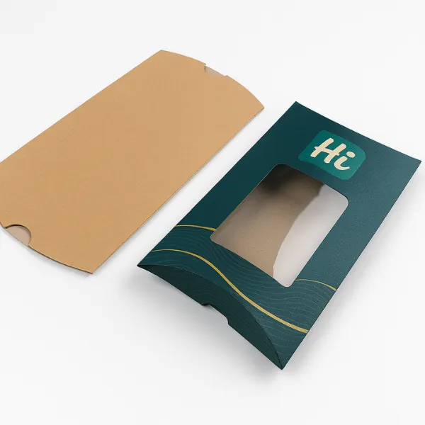 Rectangular window pillow boxes- one plain kraft- one dark green with gold wave design and Hi Custom Boxes branding- class=