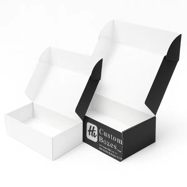 silver foiled mailer boxes - one plain white- one black exterior with Hi Custom Boxes silver branding- class=