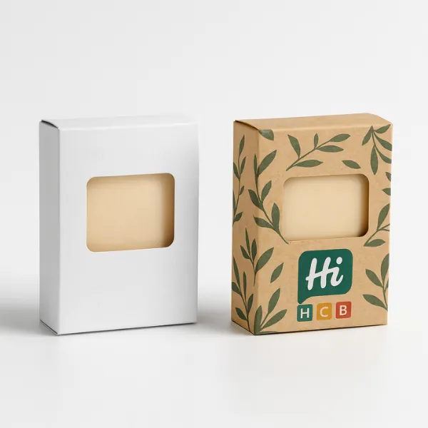Two upright soap boxes with rectangular windows - one plain white- one kraft with HCB leaves design-