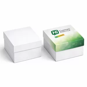 Two square luxury boxes with lids, one plain white and one with green branded graphics.