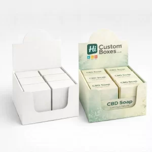 Two cardboard counter display units, one plain white and one printed with green leaf patterns.