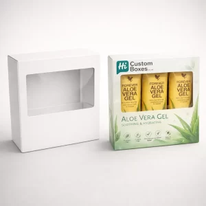 Two horizontal gift boxes with clear plastic windows: one blank white and one showing three gel tubes.