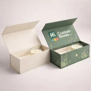 Premium rectangular magnetic lid boxes in cream and sage green, holding minimalist glass jar candles.