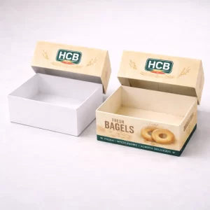 Two premium rigid boxes with lids, including a plain white option and a custom-printed bagel box.
