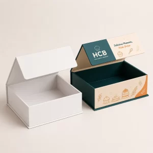 Two bespoke white and pink choux boxes with custom logos and large top windows for desserts.