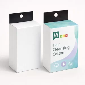 Two upright cardboard boxes for hair cleansing cotton- featuring black hanging tabs for retail display