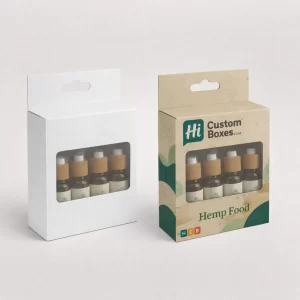 Cardboard hanging boxes with windows displaying small oil bottles, showing a white and a custom-printed option.