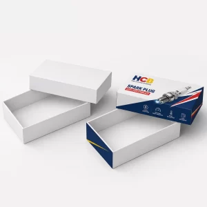 Two bespoke black and green spark plug boxes featuring professional logos and automotive part graphics.