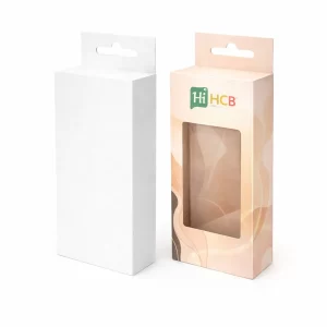 Two elegant bespoke shapewear boxes in cream and pink with minimalist branding and a smooth finish.