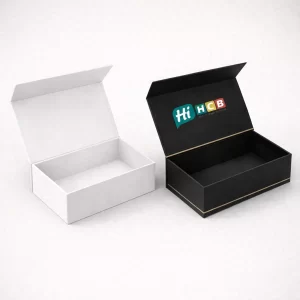 A pair of open rectangular magnetic gift boxes in matte white and black with branding.
