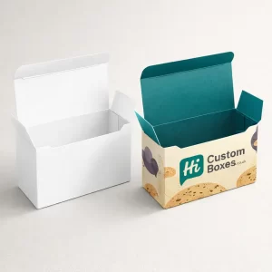 Two open cardboard biscuit boxes, one plain white and one with a teal interior lining.