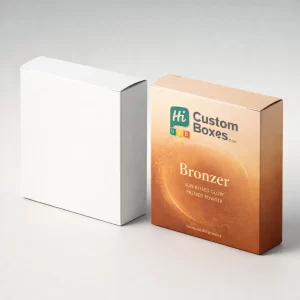 A plain white cardboard box next to a printed "Sun-Kissed Glow" bronzer box for wholesale.