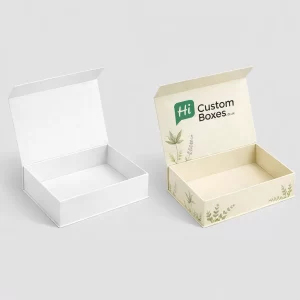 Two tall rectangular boxes, one plain white and one decorated with green floral patterns and logos.