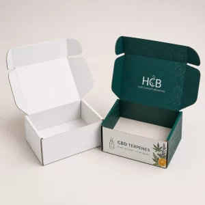 Two stylish black and gold cannabis terpene boxes with intricate patterns and high-quality printed logos.