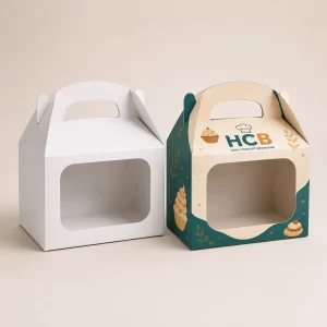 Two elegant white and pink choux pastry boxes with custom branding and clear display windows.