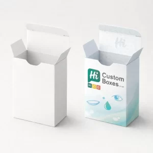 Two upright tuck-end cartons with thumb notches, one plain white and one with a branded blue design.