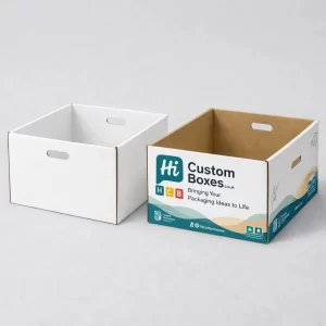 Open white and custom printed corrugated storage boxes featuring die-cut handle holes for easy carrying.