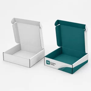 Custom white and teal archival storage boxes with reinforced hand holes.