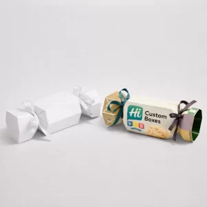 Traditional Christmas-style cracker boxes with white ribbon ties and custom-printed brand logos.