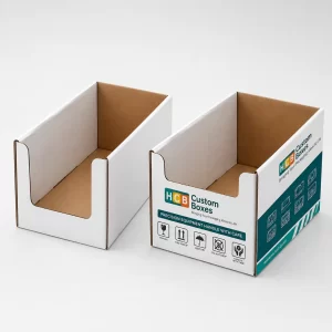 Countertop display boxes in white and teal for retail product promotion.
