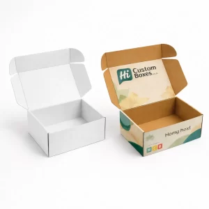 Open cardboard mailer boxes, displaying a plain white interior and a branded version with green leaf motifs.