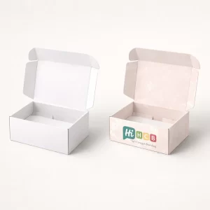 Open corrugated mailer boxes for shipping, presented in basic white and a bespoke pink floral print.