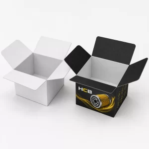 Two bespoke black and green oil filter boxes featuring custom logos and automotive part graphics.