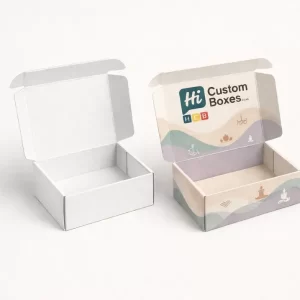 A pair of open cardboard boxes showing a clean white interior and a pastel-coloured exterior.