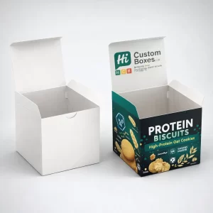 Two square cardboard boxes with open lids, one plain white and one showing dark teal branding.