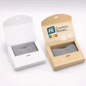 White and kraft gift boxes with a curved lid, featuring a window to see the jumper.