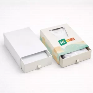 Two premium drawer-style slide boxes for t-shirts, including one with a die-cut viewing window.