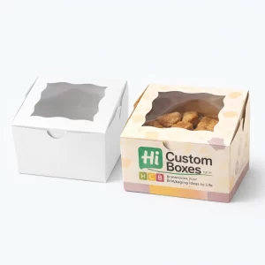 Square cardboard cake-style boxes with a wavy die-cut window on top, in white and patterned yellow.