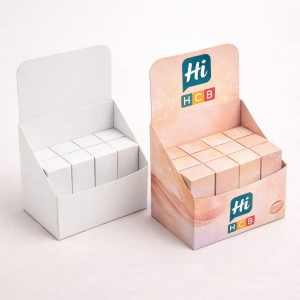 Two cardboard counter display boxes, one plain white and one branded for retail eyeshadow products.
